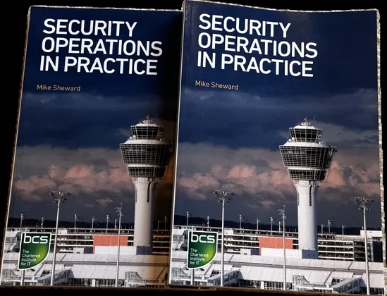 Two Copies of the book Security Operations in Practice, by Mike Sheward (@Secureowl)