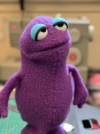 Small purple professional hand puppet