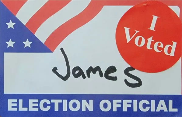 Election official sticker and I voted sticker