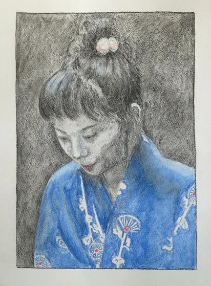 Drawing of a torso at a three-quarters angle of a young Japanese girl in a yukata with stylised motif of flowers. The yukata is tinted blue with watercolour, the flowers are white with a pink accent. The person is looking down at something in front of her. Her hair is tied up on top with a hair elastic with two white ponpons with some pink. The background is dark.
