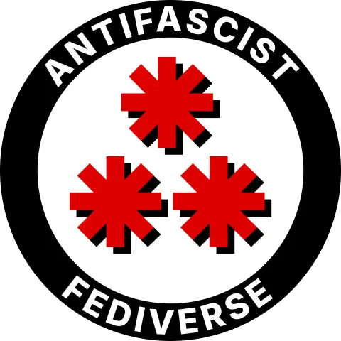 The the Fediverse symbol (⁂) in red, partially covering the same logo in black. Both are inside a white circle, enclosed in a black circular stripe. On the black circular stripe, the writing “AntiFascist Fediverse”, in capital letters.