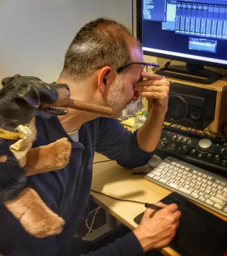 Triumph the Insult Comic Dog berating me as I edit a TV special for him.  