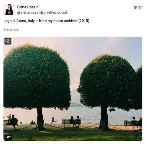 a screenshot of my first Pixelfed post (a photo of Lake Como) as it appears in my Mastodon feed