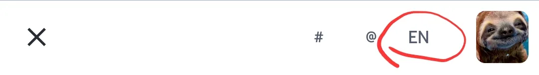Partial screenshot of the "new post" view on Tusky, the "EN" button, allowing you to declare what language the post is written in, is highlighted 