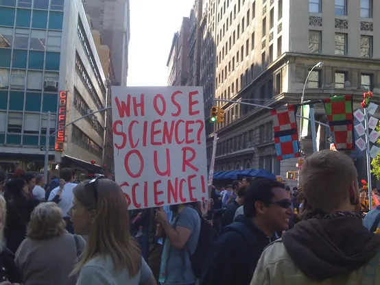 A hand lettered sign at a May Day/Occupy Wall Street march (2012, NYC), that says, Whose Science? Our Science! 