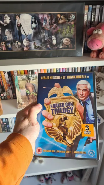 DVD box of the Naked Gun Trilogy. 