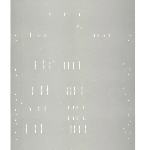 Debussy piano roll. A sheet of paper with punctures