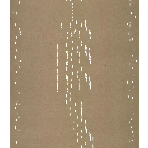 Debussy piano roll. A sheet of paper with punctures