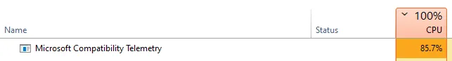 Screenshot of Windows Task Manager showing that a service called 'Microsoft Compatibility Telemetry' is using 85.7% of the CPU