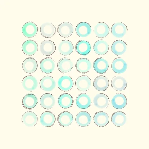 A Grid of imperfect circles in blue shades with imperfect crayon outlines