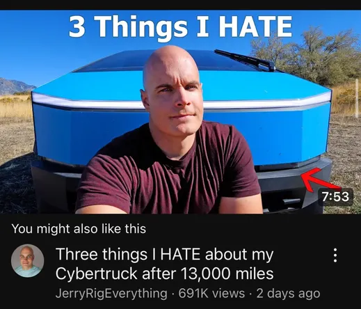 A bald man sitting in front of a blue wrapped Cybertruck. 

Three things I HATE about my Cybertruck after 13,000 miles JerryRigEverything