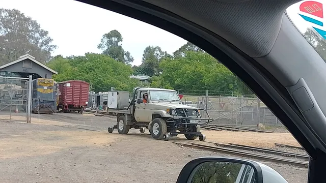 Toyota Land Cruiser with rail skates in order to roll along railway tracks