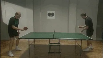 a gif of two guys playing ping pong.
the play off guy throws the ball in the air, looks (in the air) .. and looks .. the other guy looks also up in the air and the first guy plays the hidden ball fast and short out of his hand and wins the point.
the other one stares angry at the joker