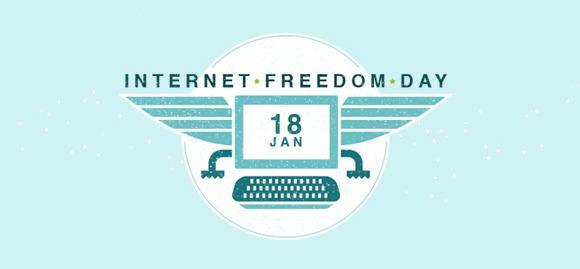 A computer screen with a keyboard down. The screen contains text "18 JAN". It has an eagle-like wings and legs. On the top, there is a text "INTERNET FREEDOM DAY".