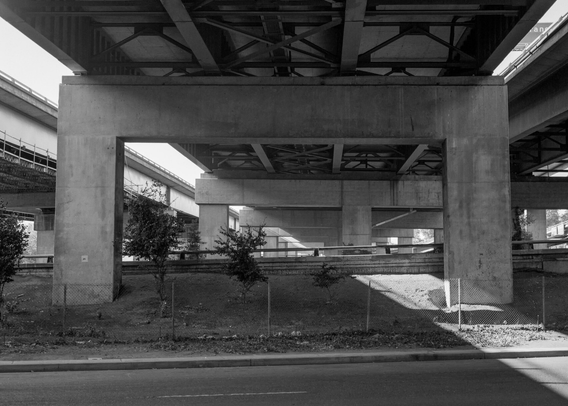 B&W photo of under the Interstate 5 split on Business 80. 