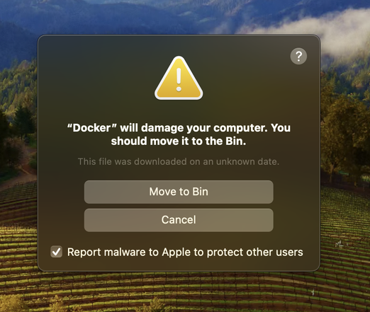 a MacOS malware popup advising that Docker will damage your computer, and it should be moved to the bin