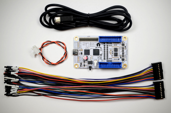 Glasgow revC PCB with the associated USB-C, Sync and IO Cables. The Glasgow PCB is white with black text and blue 20 pin IO headers.
