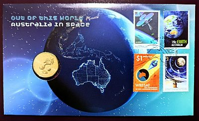 PNC with coin showing reverse, image of the globe at night showing lights of Australia, four stamps top-right