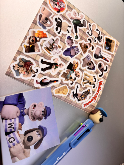 Wallace & Gromit merchandise: stickers, a photo card, a ballpoint pen