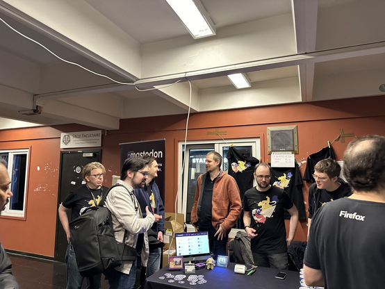 The Mastodon booth at Fosdem 2024 with the Mastodon team.