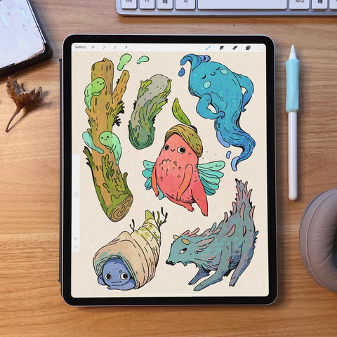 drawing of several cute creatures resembling ghosts or chunky nature fairies 