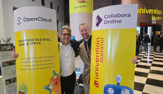 Peer Heinlein and Michael Meeks seal partnership between OpenCloud and Collabora Online.