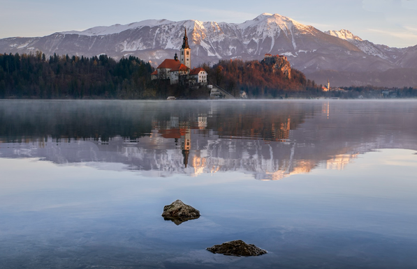 Slovenia early morning church and lake