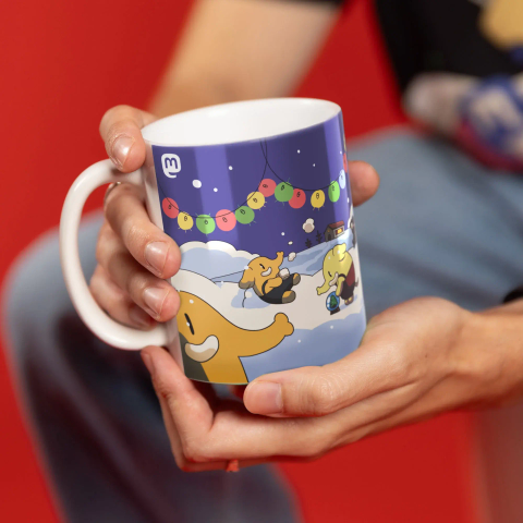 Photo of the Mastodon Winter Mug, showing multiple Mastodon mascots playing in the snow