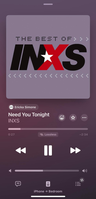 Album art for "The Best of INXS," featuring the song "Need You Tonight." Display includes playback controls and device information at the bottom.