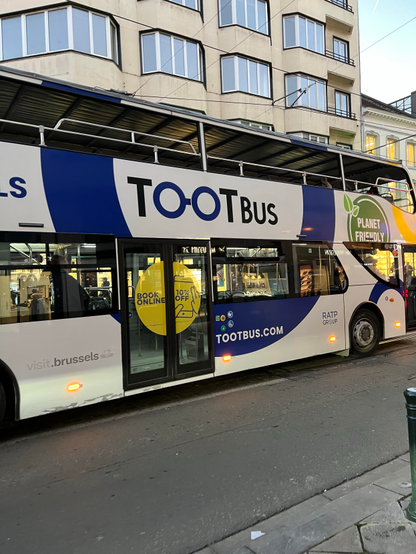 a blue and white double decker bus that says "TO-OT BUS"