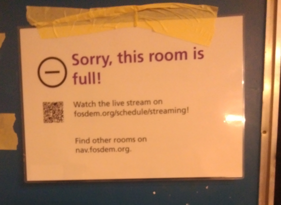 a sign on a door saying " sorry this room is full"