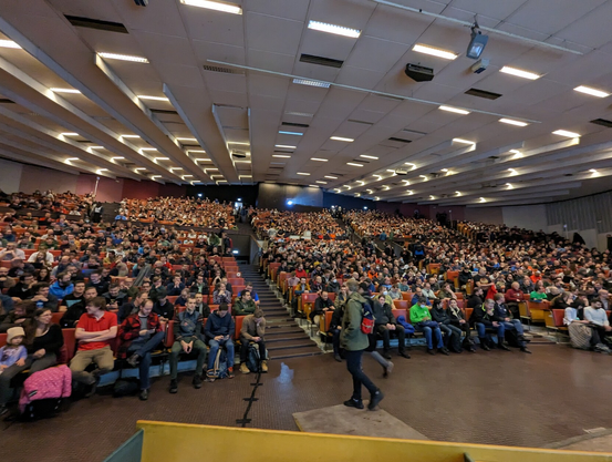A photo of a packed room, Janson at ULB Solbosch Brussels, from the speaker's perspective.