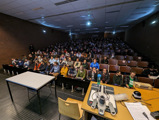 A room full of people during a talk