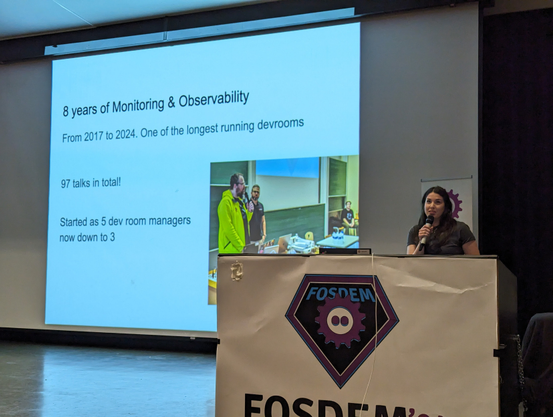 Ana giving a summary of the monitoring and Observability devroom as part of the FOSDEM highlights.