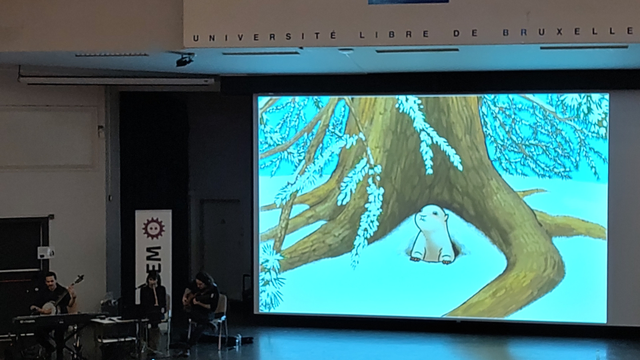 Janson stage, showing ZeMarmot and a live music band playing.