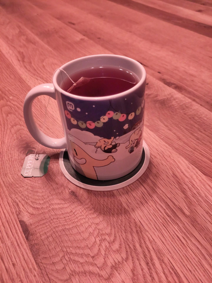 Reddish tea within the cute Mastodon mug