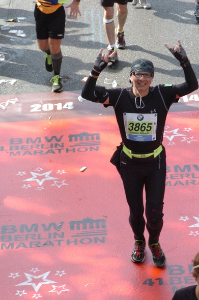 Crossing the finish line of my first marathon, Berlin 2014