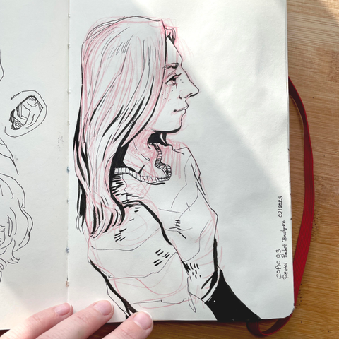 Portrait study of a girl in a side profile with darker shadows and red sketch lines underneath