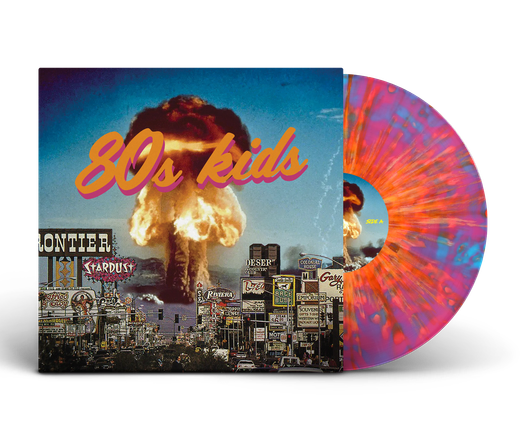 This is a photo of a vinyl record and jacket. The record has a brightly-colored splatter pattern with orange, pink, blue, and purple. The jacket cover is a 1980s-era Las Vegas being blown up by a nuclear bomb. The words "80s kids" is superimposed on the image in a jaunty orange and pink font. 