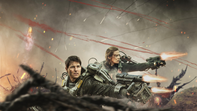 Tom Cruise and Emily Blunt in mech suits shooting aliens in the movie Edge of Tomorrow. Lots of rockets flying around.