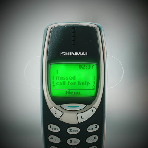 album art for shi's release "1 missed call for help" featuring a Nokia style phone with the text "1 missed call for help" on screen. There are various subtle audio visualisation effects in the video.