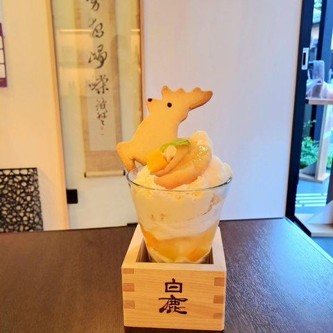 Peach parfait with leaping deer biscuit.