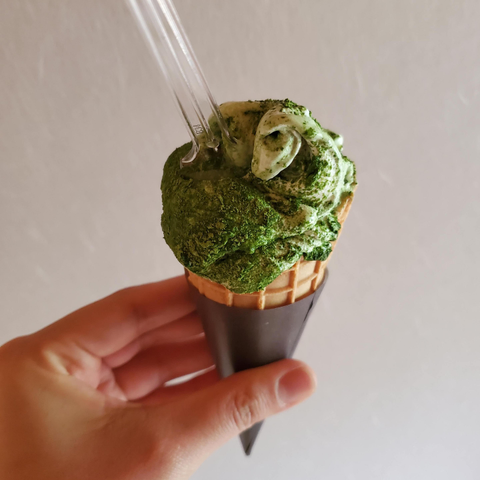 Matcha gelato, sprinkled with matcha powder.