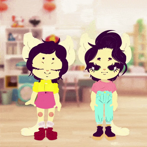 [Animated GIF] Twin Kitty-like Japanese teachers, Kiki and Koko, give a wave, saying, "Konnichinyaa." Kiki, on the left, with short dark hair, big green eyes, and fluffy kitty ears, wearing a bright yellow button-up and pink skirt, points to herself. "We're Kiki..." To the right, Koko, with longer quaffed hair, a pink tee shirt and cyan jeans, points to herself and finishes the phrase, "and Koko." They both gesture, "your guides to Japanese language and culture." The movements are bright and fluid, and above, there are hand-animation-styled captions in sunny retro block letters with Japanese script, then English. In the bottom corner, it indicates in the same font that this is from ieindigoeast.com.