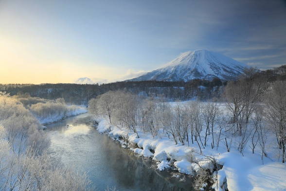 Yōtei in Hokkaido seen from a distance with a river in the foreground