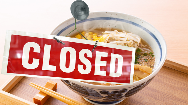 A bowl of ramen with a Closed sign superimposed over it