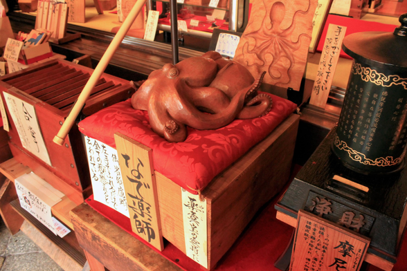 'Nade-tako' - a small octopus statue intended to be rubbed by the faithful in the hope it will cure ailments and sickness. Typically you rub the area of the statue that corresponds to a problem you are having (the head for headaches etc...).