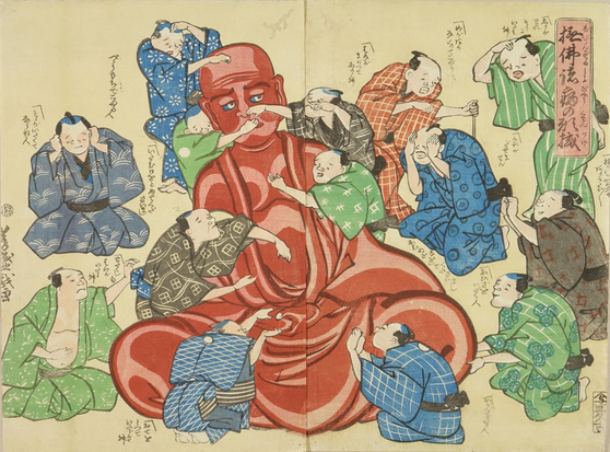 Woodblock print of a 'rubbed Buddha', a statue of Buddha intended to be rubbed by the faithful as an act of faith.

Image thanks - https://ukiyo-e.org/