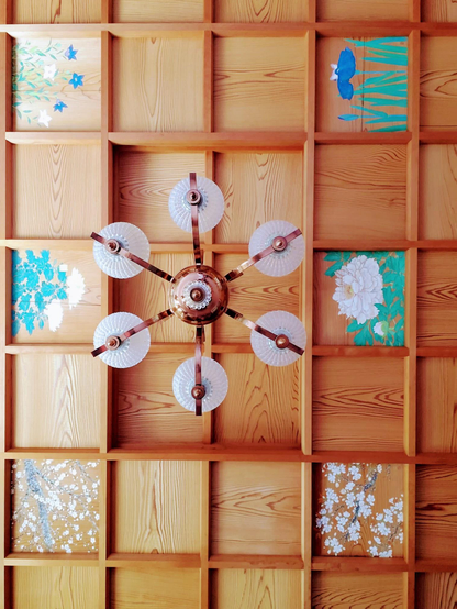 Painted ceiling panels at Kyutei Omuro, decorated with images of flowers.