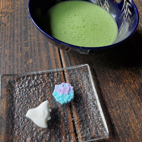 Dried sugar sweets in the shape of a plover and hydrangea.